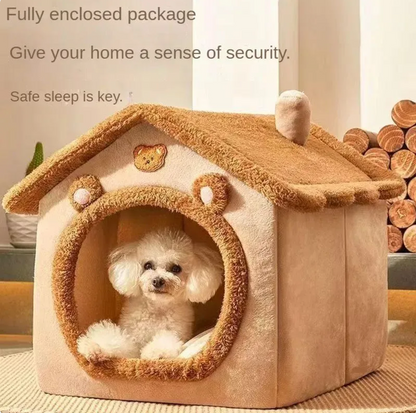 Tan house-shaped pet bed with a wide arched entrance and a small dog sitting inside.