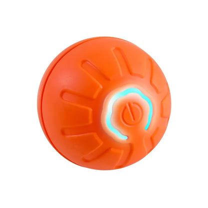 Close-up of an orange ball with raised grooves and a turquoise loop-shaped panel.