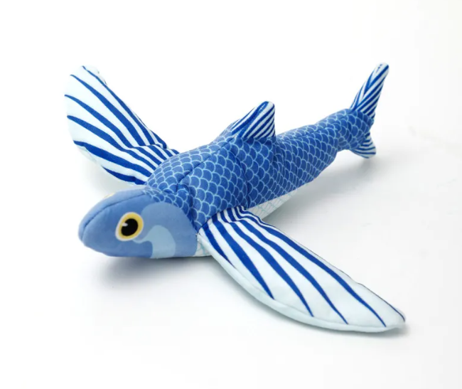 Blue fish-shaped plush with a scale pattern, striped fins and striped tail, shown from above at an angle.