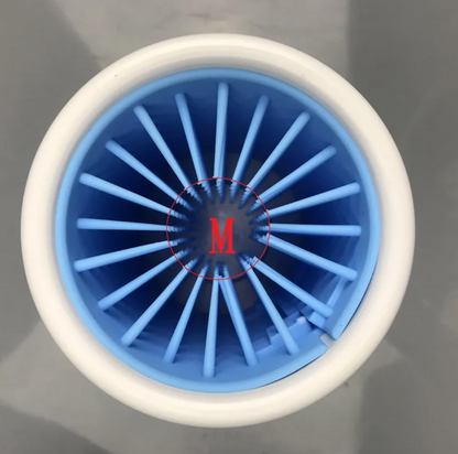 Close-up looking into the cup, showing blue radial fins inside a white rim and a small red detail at the center.