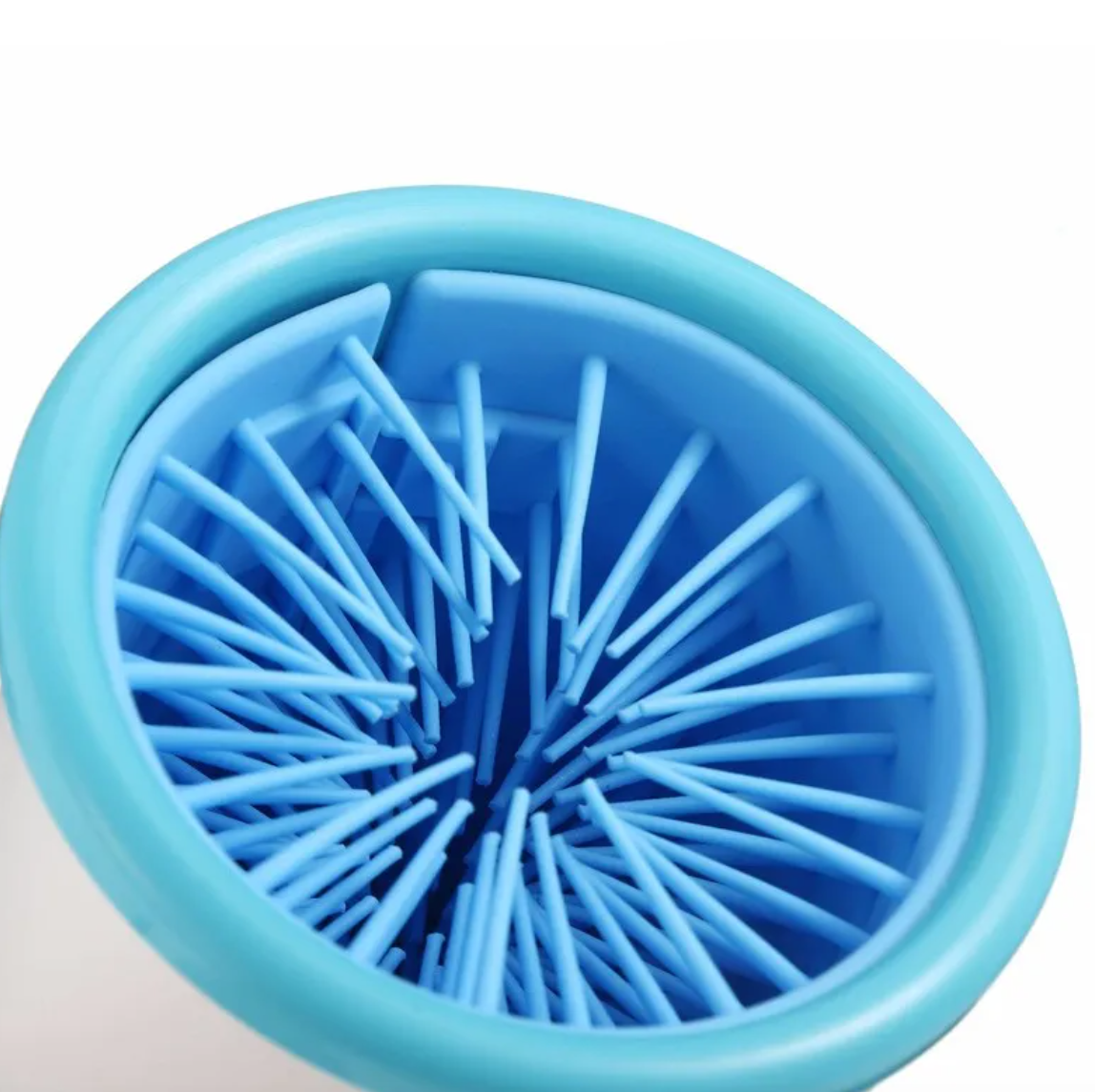 Close-up of a blue radial-finned insert with a turquoise outer rim.